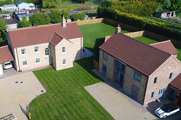 Aerial view of a small development of detached homes