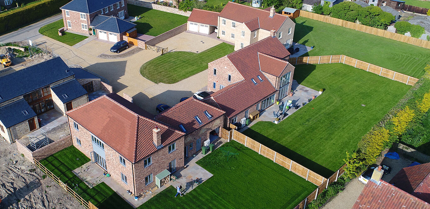 Aerial view of a cul-de-sac of new homes