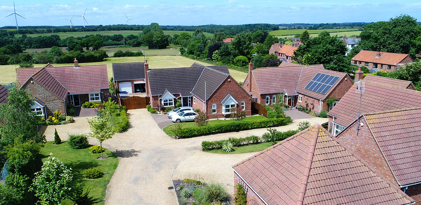 Aerial view of a landscaped Derek Hales development